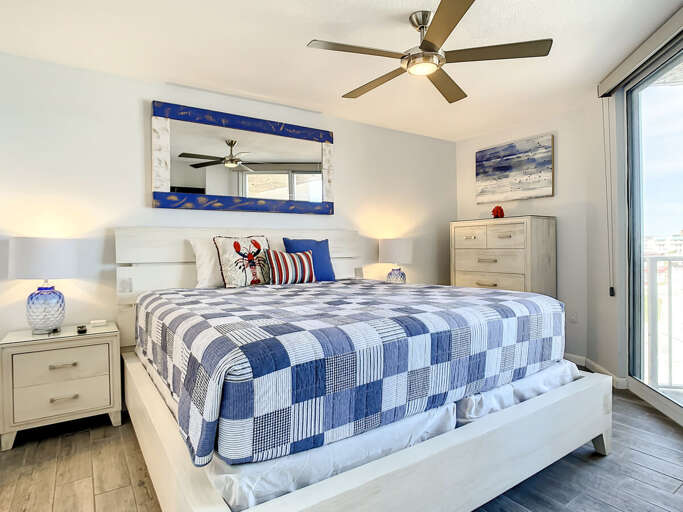 King size bed with nightstand and dresser for storage. King size bed with nightstand and dresser for storage.