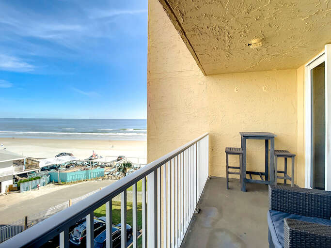 Partial ocean view. Seating for 4. Partial ocean view. Seating for 4.