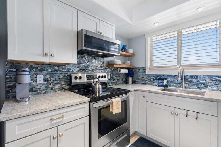 Small Space, Stainless Steel, Stone Surfaces, Sleek Shelves