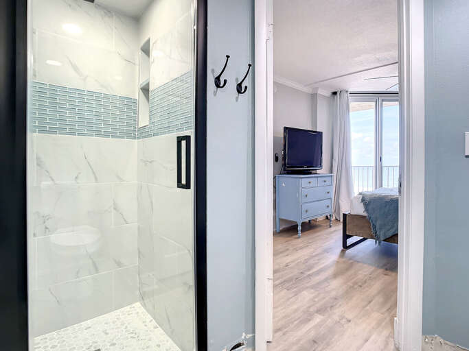 Walk in shower. Access to master.