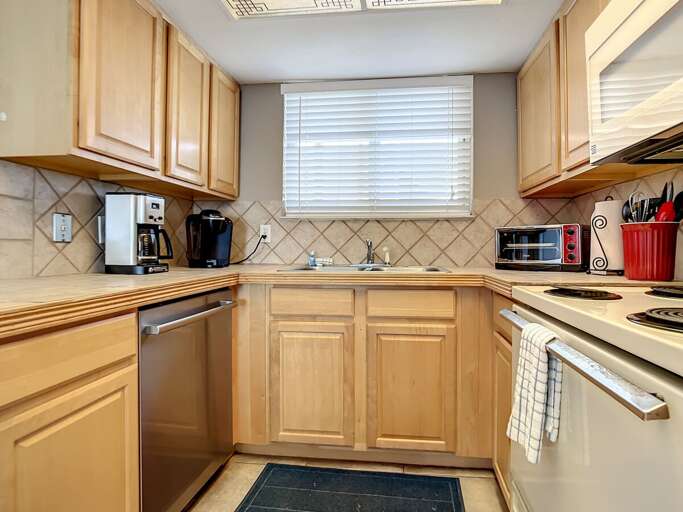 Storage and built in dishwasher. Storage and built in dishwasher.