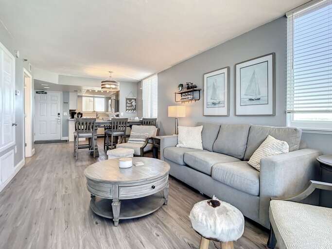 Cozy couch and chairs that seat 5.