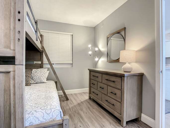 Dresser for storage and mirror.