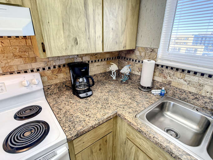 Coffee maker and double sink. Coffee maker and double sink.