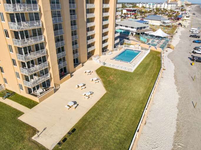 5 picnic tables with 2 charcoal grills. 5 picnic tables with 2 charcoal grills.