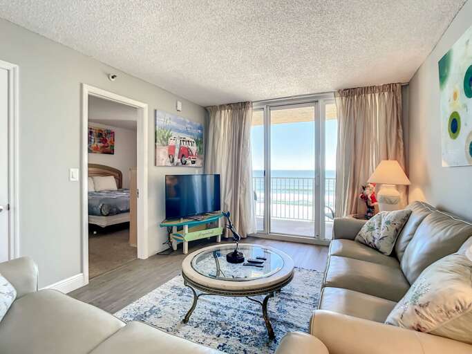 Living room overlooking balcony. Flat screen TV Living room overlooking balcony. Flat screen TV