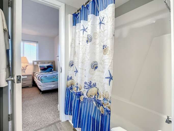 Shower tub combination. Access to guest room. Shower tub combination. Access to guest room.