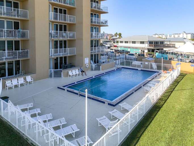 Pool with lounge chairs.