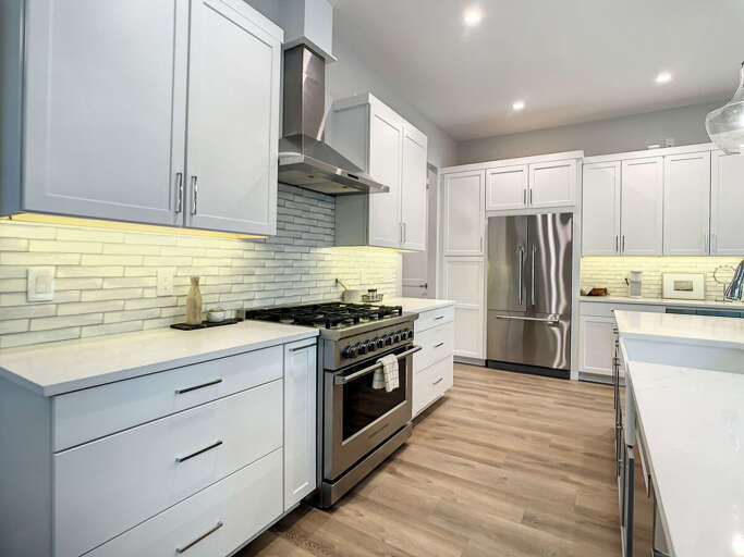 From the expansive island to the inviting dining area and convenient breakfast bar, our space is tailored for culinary delights and cozy gatherings.