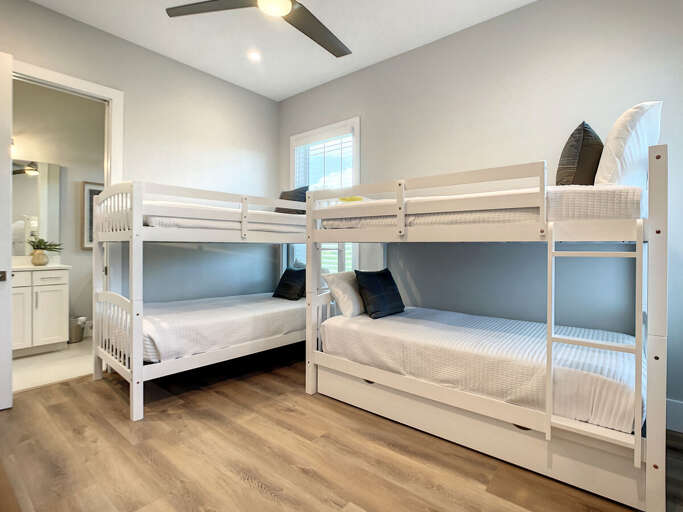 Our kids' room boasts bunk beds galore, providing a cozy retreat for young adventurers, plus a full-size bathroom for easy cleanup