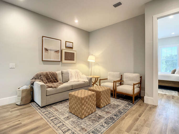 Our loft features additional seating and ample space for guests to unwind and connect during their stay.