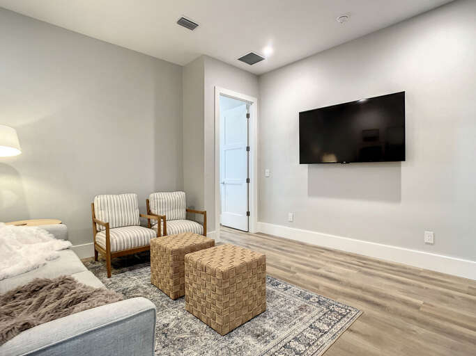 Our spacious loft offers extra seating and a welcoming atmosphere, perfect for guests to spread out and enjoy quality time together.