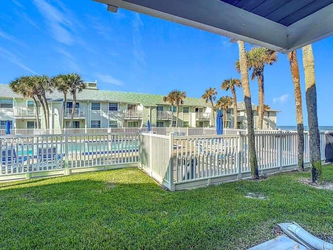 Enjoy the lush lawn and sparkling pool view steps away from your doorstep. Enjoy the lush lawn and sparkling pool view steps away from your doorstep.