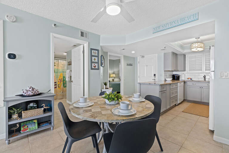 Interior Of A Vacation Rental With Dining Area And Kitchen