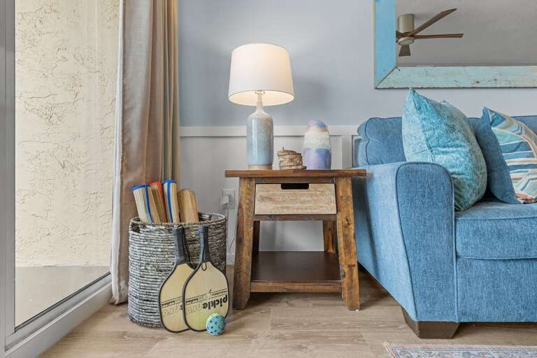 The soft blues and natural textures create a relaxed, beachy vibe perfect for a seaside retreat.