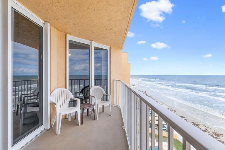 Relax on your private beachfront balcony and soak up stunning ocean views. Enjoy your morning coffee or evening sunset with the soothing sound of waves right outside your beach getaway.