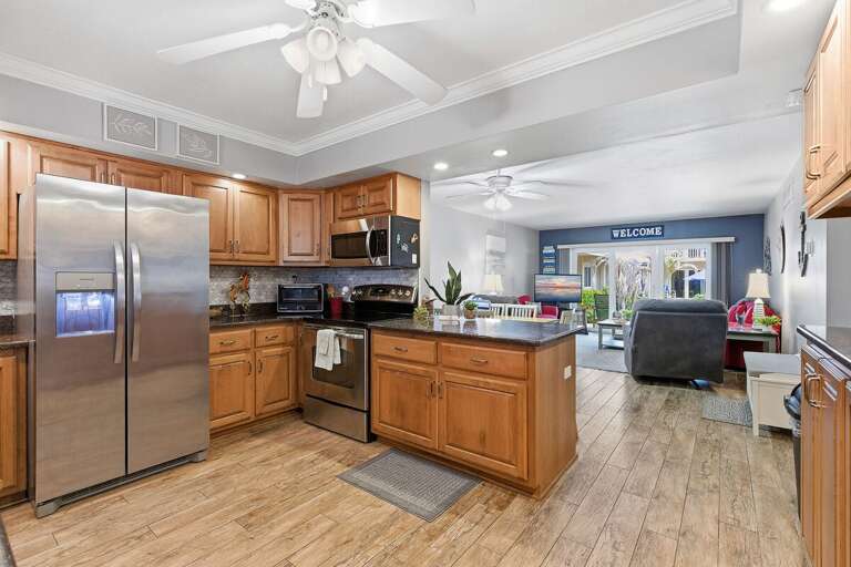 Enjoy a fully equipped kitchen with modern appliances and an open-concept living space designed for