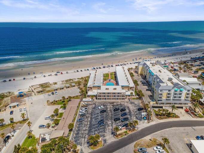 Enjoy breathtaking oceanfront views and direct beach access at this coastal condo resort. The perfect beach stay for relaxing by the shore, lounging poolside, and experiencing seaside living.
