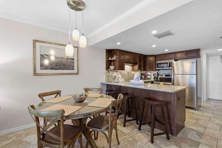 Enjoy a stylish open dining area and fully equipped kitchen perfect for family meals after a day at the beach. This inviting beach stay offers comfort, convenience, and a relaxing coastal atmosphere.