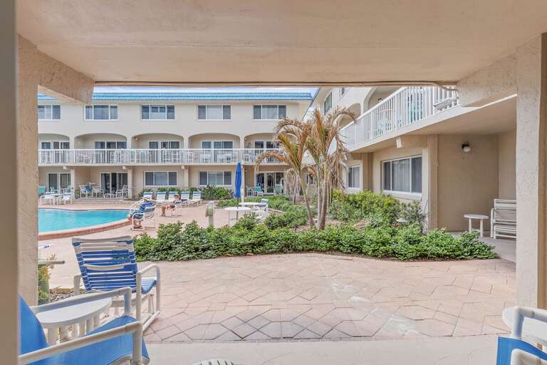 Enjoy your beach stay with easy access to this resort-style pool and relaxing patio seating. Soak up