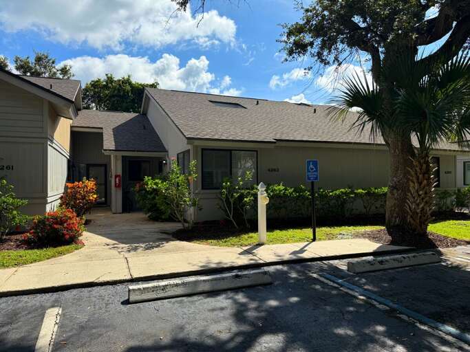 Welcome to your beach retreat! This charming villa offers a peaceful setting with lush landscaping and easy access to the shore, perfect for a relaxing seaside getaway.