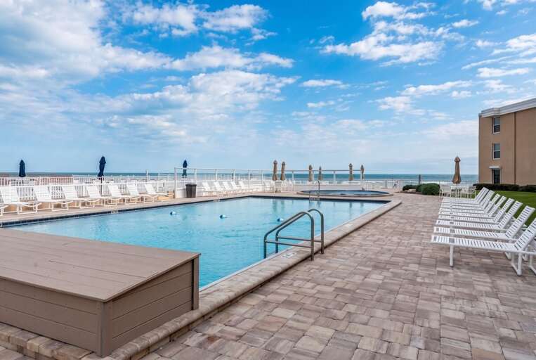 Dive into the refreshing oceanview pool or relax on a poolside lounger. Enjoy stunning beach views while soaking up the sun in this beautiful coastal getaway spot.