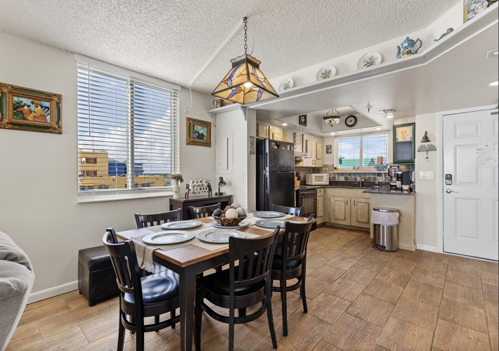 Enjoy family meals in this beach condo's inviting dining space with seating for six. A fully equipped kitchen makes your beach stay easy and convenient for cooking and entertaining. Enjoy family meals in this beach condo's inviting dining space with seating for six. A fully equipped kitchen makes your beach stay easy and convenient for cooking and entertaining.
