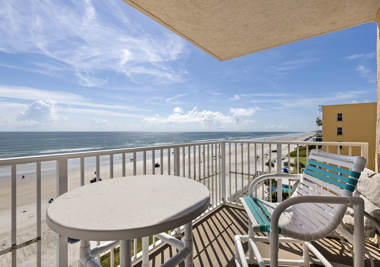 Relax on your private balcony with stunning oceanfront views. Enjoy morning coffee or sunset drinks just steps from the beach—perfect for your next coastal getaway.