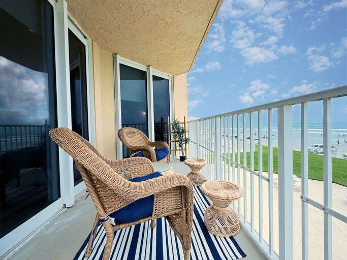 Take in stunning beach views from your private balcony, complete with cozy wicker seating. Perfect for sipping coffee at sunrise or relaxing after a day of fun in the sun.
