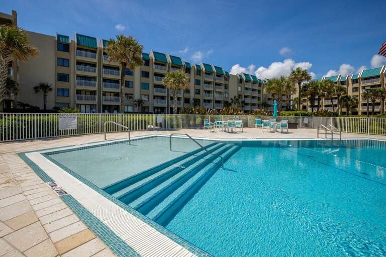 Make the most of your beach stay with a refreshing dip in this crystal-clear resort pool, surrounded by lounge seating and located just a short stroll from the sandy shoreline. Make the most of your beach stay with a refreshing dip in this crystal-clear resort pool, surrounded by lounge seating and located just a short stroll from the sandy shoreline.