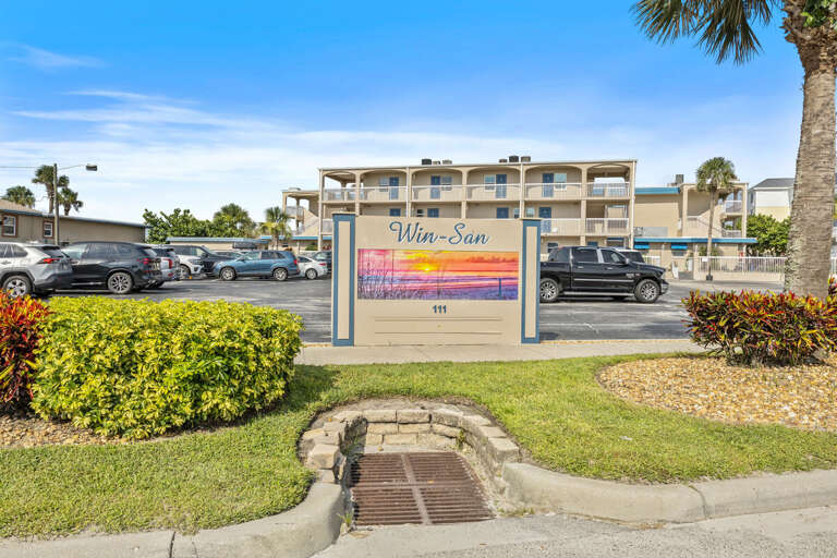 Arrive with ease at Win-San, your beachside vacation retreat. This welcoming entrance sets the tone for a relaxing coastal stay just steps from the ocean. Arrive with ease at Win-San, your beachside vacation retreat. This welcoming entrance sets the tone for a relaxing coastal stay just steps from the ocean.