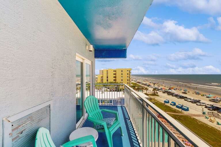 Balcony View Of Beach And Buildings From Vacation Rental