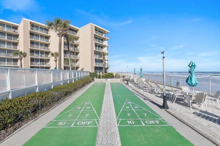 Add some friendly competition to your beach stay with oceanfront shuffleboard courts just steps from the sand. Enjoy coastal views, sea breezes, and nearby seating while making vacation memories.