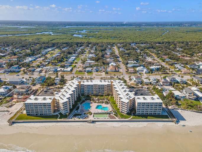 Discover the perfect beach stay at this beachfront resort featuring two sparkling pools, direct
