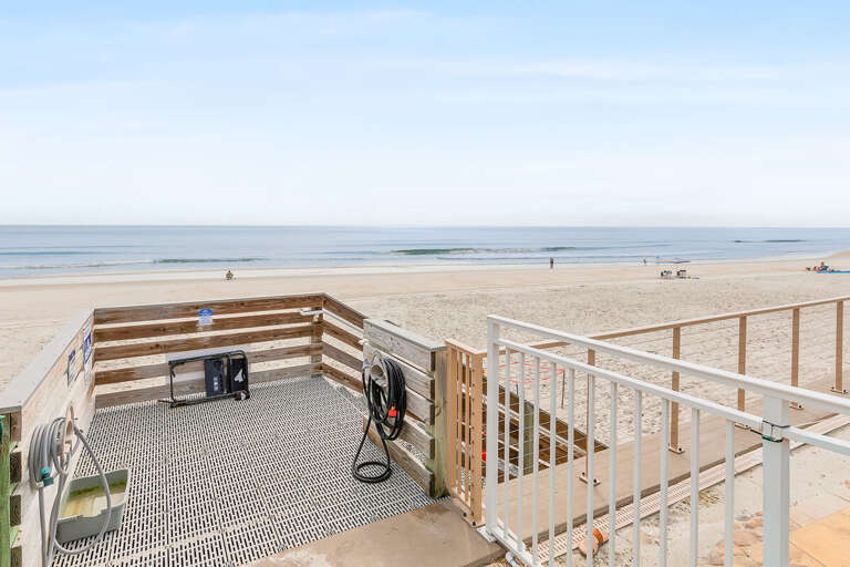 Step from the resort onto the sandy shoreline with convenient direct beach access and an outdoor