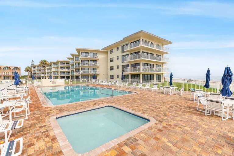 Enjoy the best beach stay with a sparkling oceanfront pool, relaxing hot tub, spacious sun deck, and