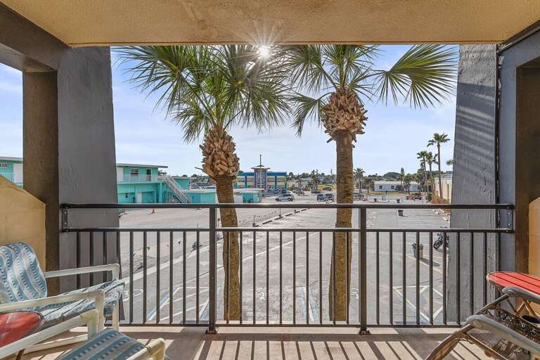 Soak up the sunshine and palm-lined views from your private balcony during your beach stay. A relaxing spot for morning coffee or evening breezes, just moments from the sand and seaside attractions.