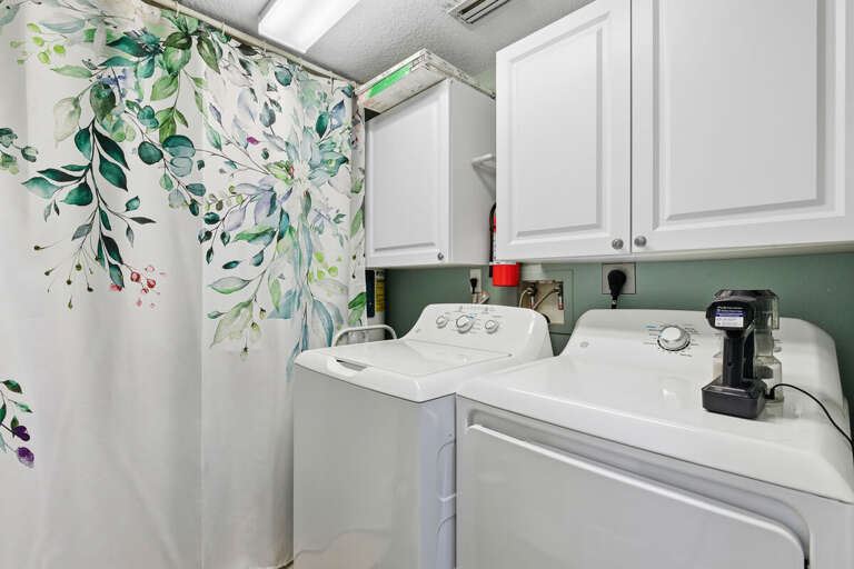 Enjoy the ease of in-unit washer and dryer, perfect for refreshing towels and beachwear during your beach stay. A convenient amenity to keep everything clean after fun-filled days by the ocean.