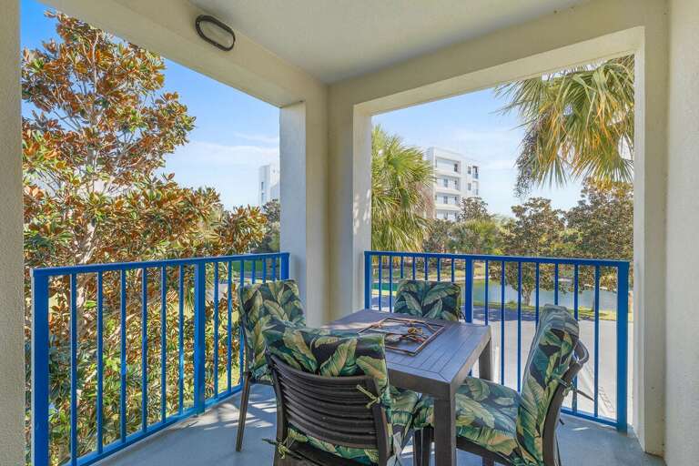 Relax on this private balcony with comfortable seating and lush views. Perfect for morning coffee or evening unwinding during your beach stay, offering a peaceful outdoor escape near the coast.