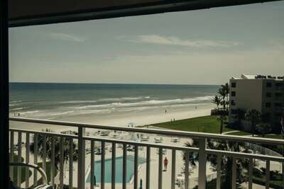 Relax at this oceanfront beach stay featuring stunning balcony views of the shoreline, resort-style