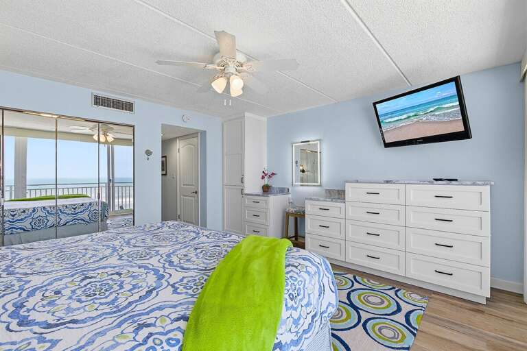 Enjoy your beach stay in this bright coastal bedroom featuring ocean views, comfortable furnishings, and plenty of space to relax. A perfect retreat after soaking up the sun and surf.