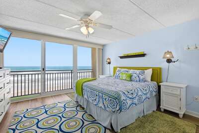 Wake up to stunning ocean views in this bright beachfront bedroom. This relaxing beach stay features
