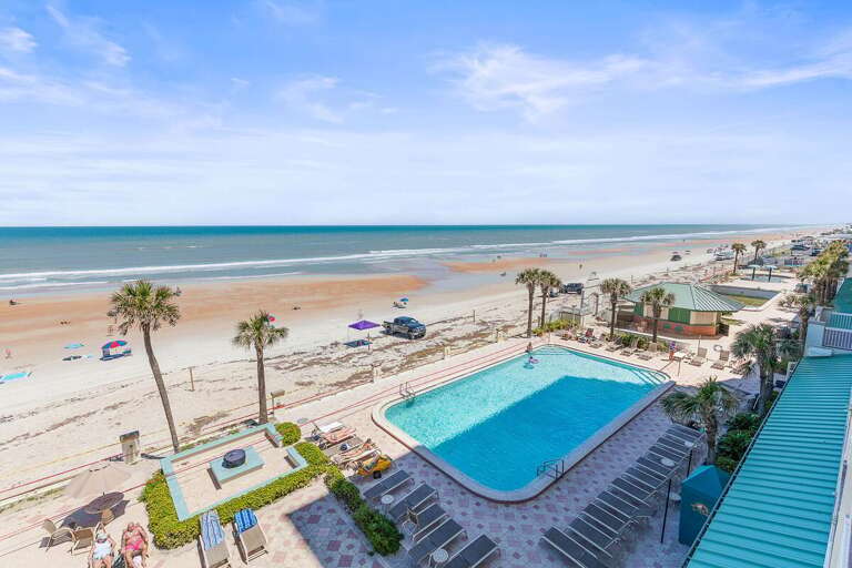 Soak up the sun with direct oceanfront views overlooking the pool and sandy shoreline. This beach
