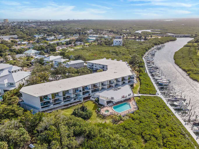 Relax at this beach stay featuring a waterfront condo with pool, private marina, and scenic