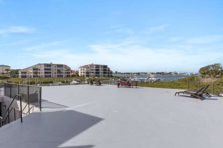 Take in sweeping marina views from this spacious sun deck, perfect for lounging during your beach stay. Enjoy open-air relaxation, sunshine, and easy access to the pool and waterfront amenities.