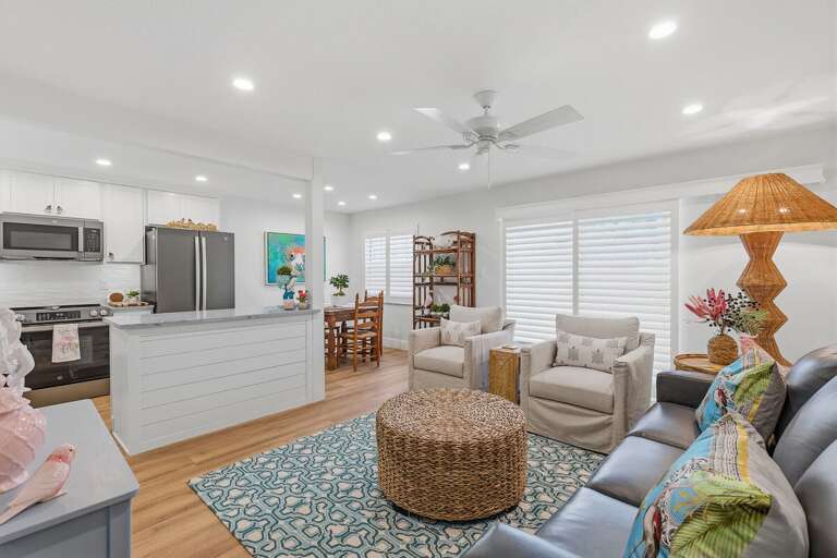 Unwind in this bright and airy beach stay featuring coastal décor, an open-concept kitchen, and comfortable seating. Perfect for relaxing after a day at the beach or exploring the nearby coast.
