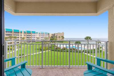 Relax on your private balcony overlooking lush resort grounds, sparkling pool, and the Atlantic