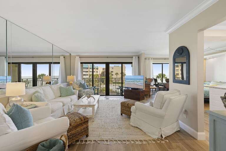Unwind in this spacious coastal living room featuring comfortable seating, beach-inspired décor,
