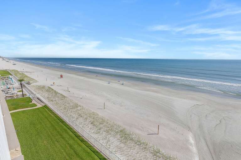 Soak in sweeping views of the sandy shoreline and sparkling Atlantic Ocean stretching along the coast—a picture-perfect backdrop for sunny days, ocean breezes, and an unforgettable beachfront stay.
