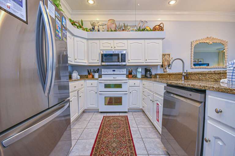 Bright, spacious kitchen with modern stainless steel appliances